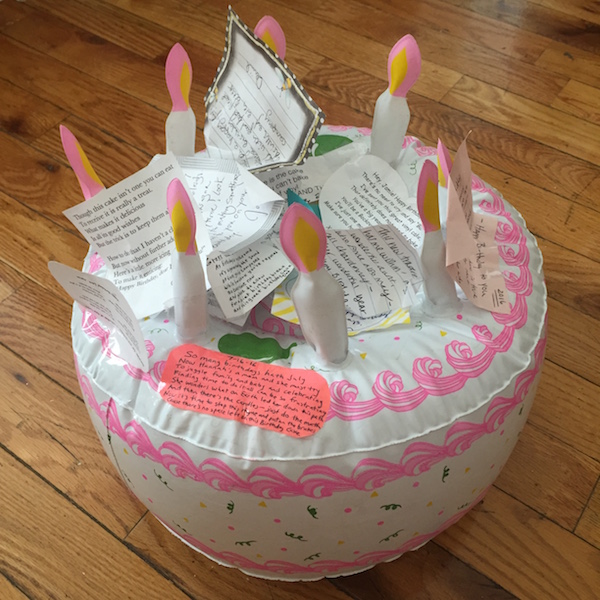 inflatable birthday cake with paper icing